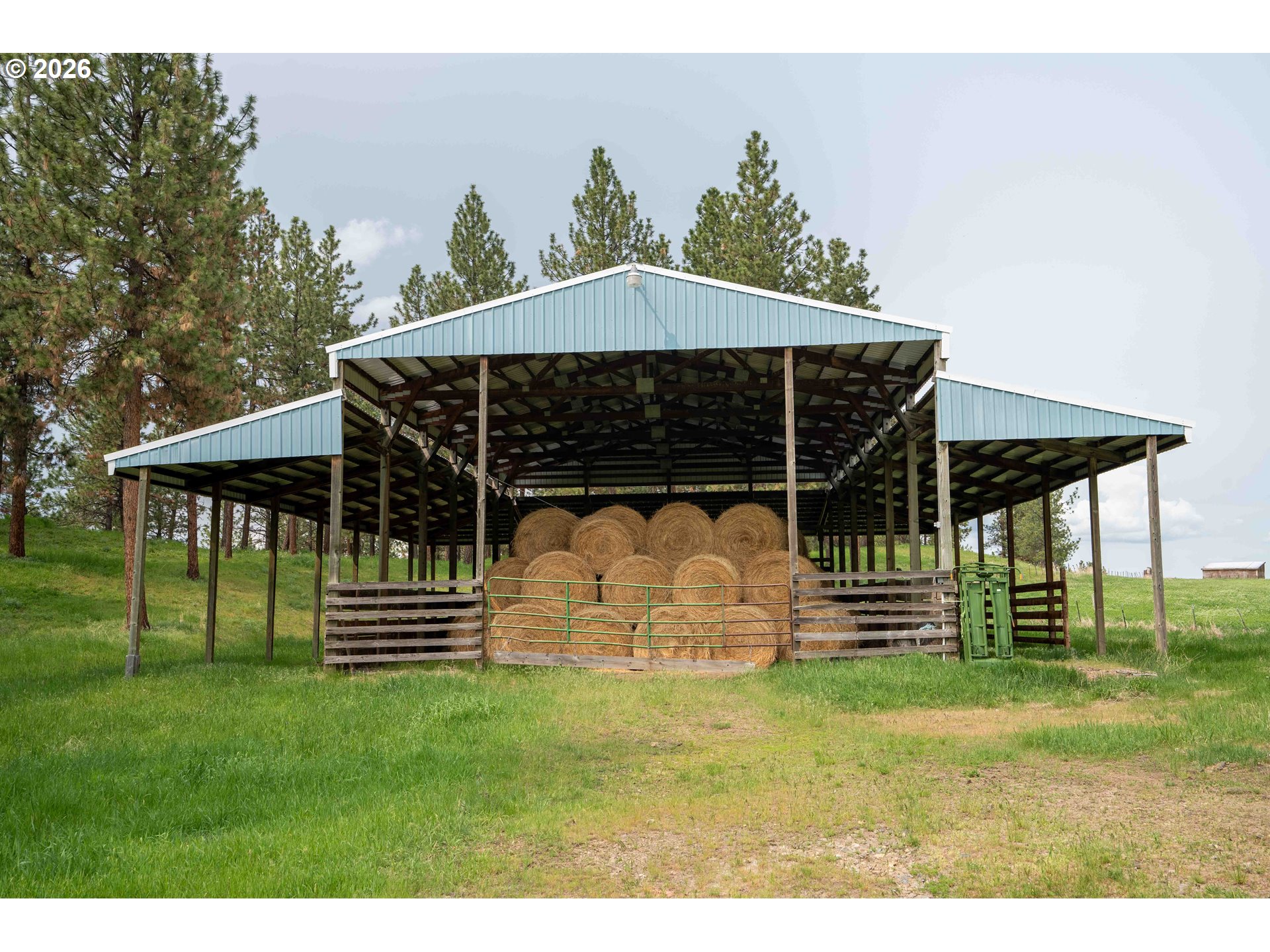 83584 Troy Road Wallowa, OR 97885 - Photo 42 of 48 a front view of a house with a yard