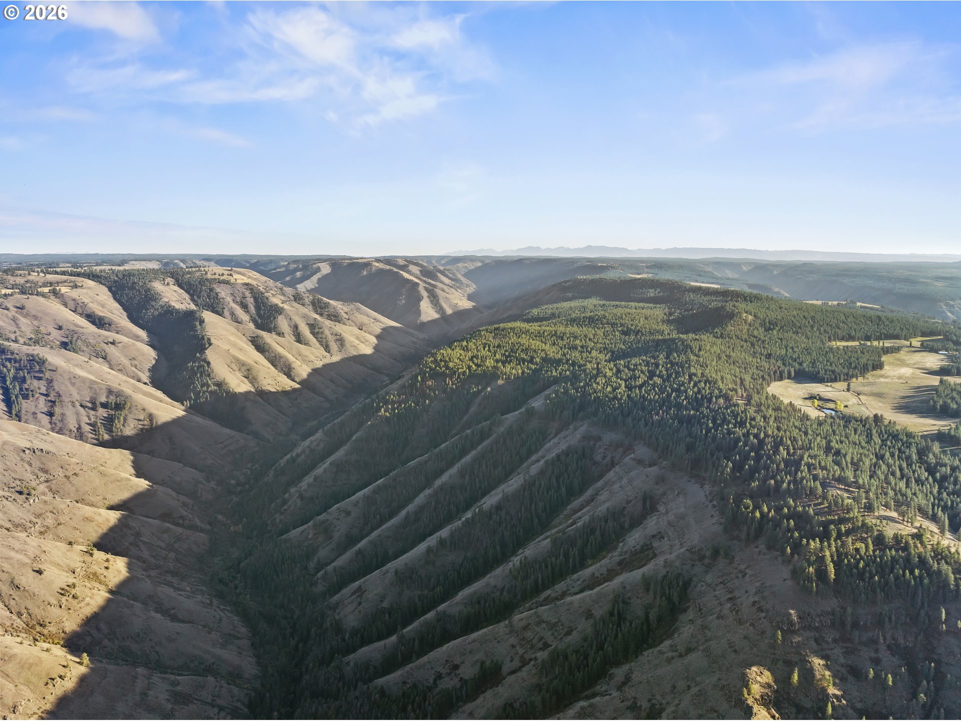 83584 Troy Road Wallowa, OR 97885 - Photo 47 of 48 a view of a lake with mountains in the background