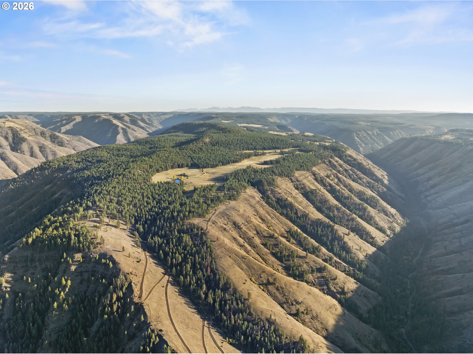 83584 Troy Road Wallowa, OR 97885 - Photo 5 of 48 a view of a yard