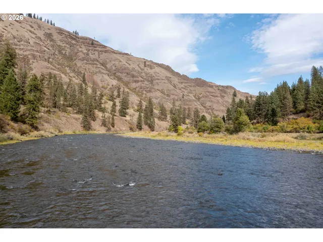 a view of a lake in middle of the town