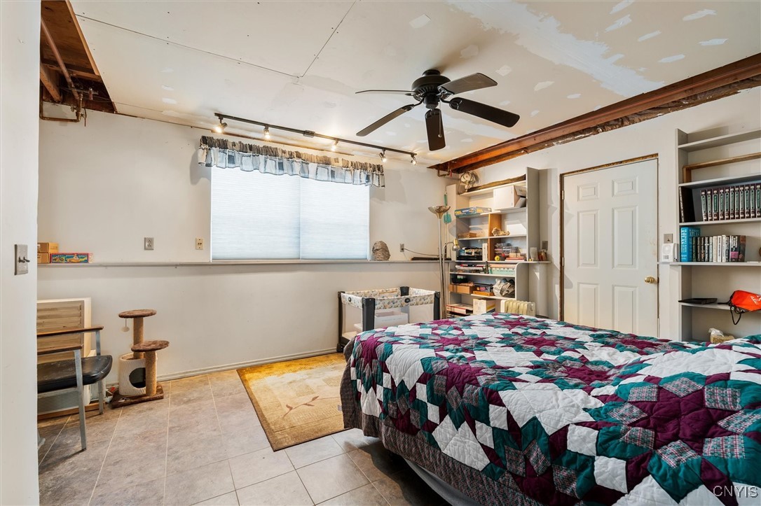 2336 Turner Road Cato, NY 13166 - Photo 23 of 44 4th basement in basement--3 built-in bookcases