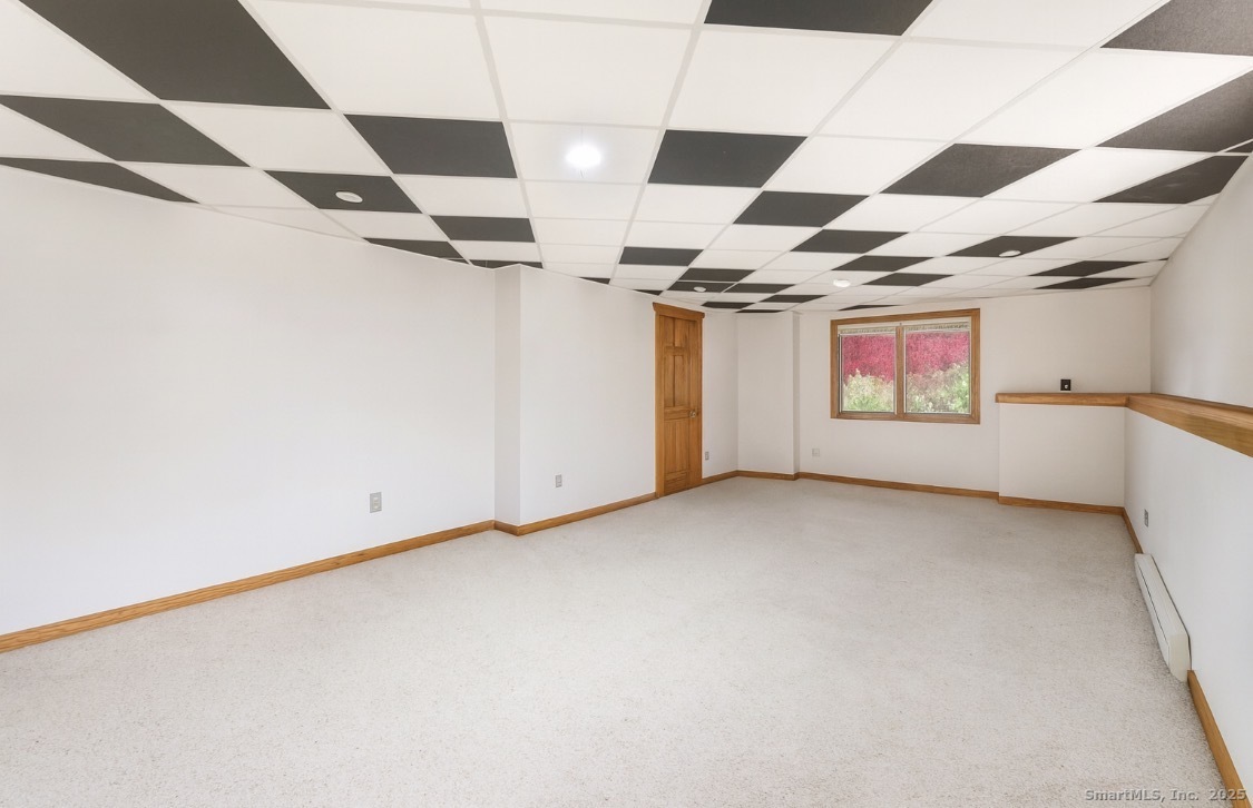 63 Buck Hill Road Canterbury, CT 06331 - Photo 17 of 25 a view of a room with gym equipment