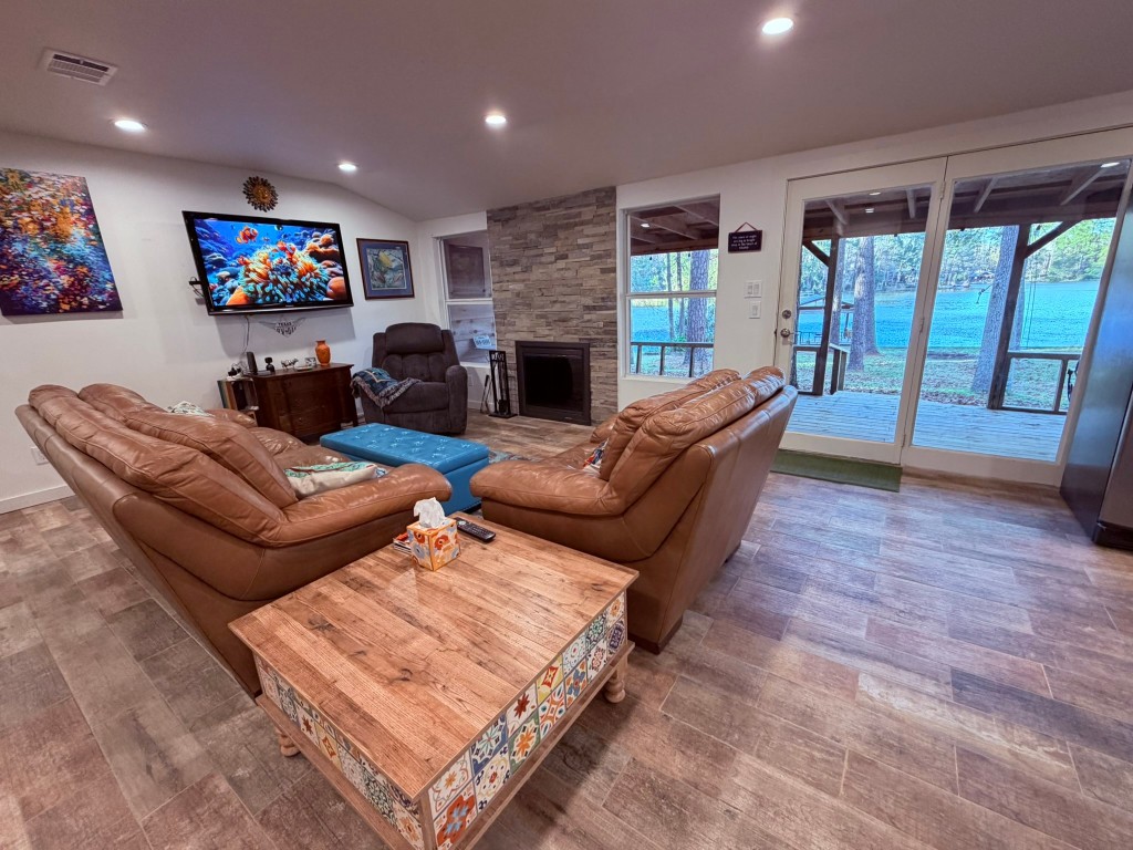 251 County Road Goodrich, TX 77335 - Photo 16 of 50 a living room with furniture and a fireplace