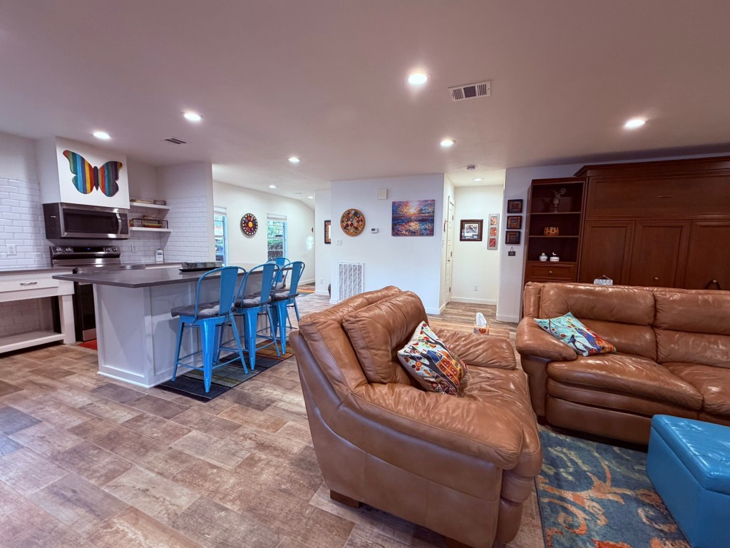 251 County Road Goodrich, TX 77335 - Photo 19 of 50 a living room with furniture and kitchen