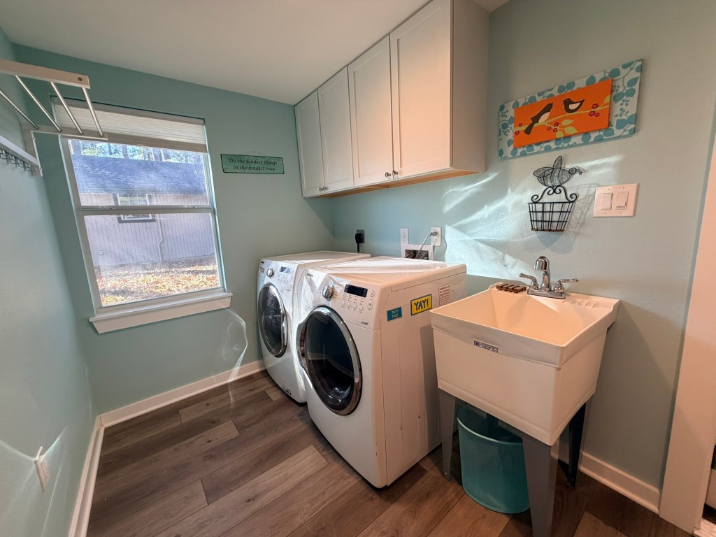 251 County Road Goodrich, TX 77335 - Photo 28 of 50 a utility room with dryer and washer