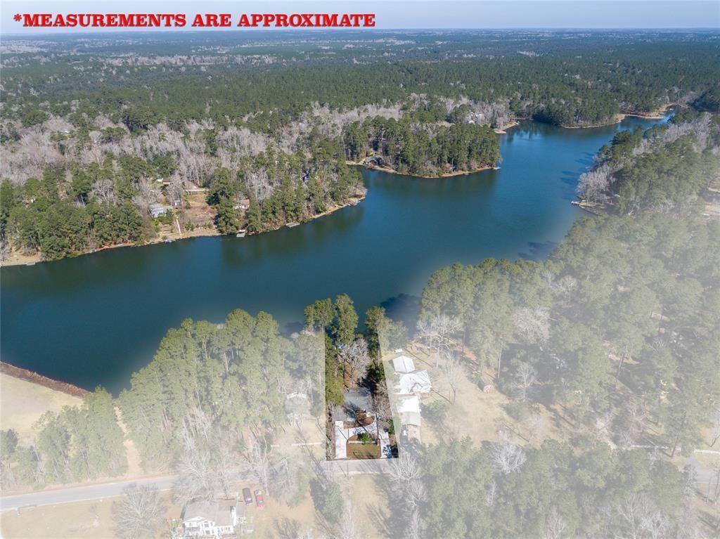 251 County Road Goodrich, TX 77335 - Photo 48 of 50 a view of lake view and mountain view