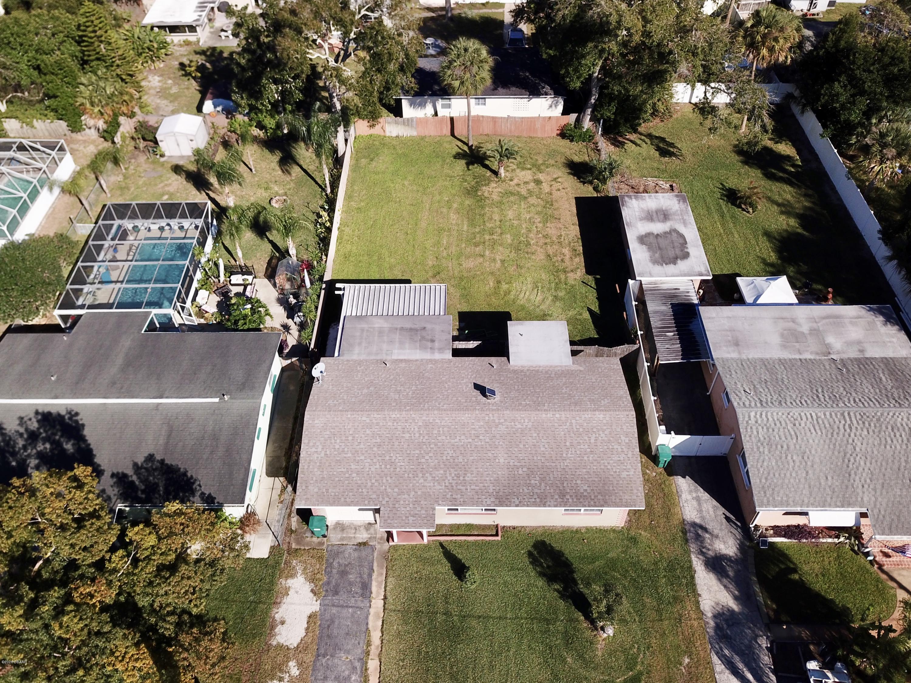 1509 Ridge Avenue Holly Hill, FL 32117 - Photo 36 of 40 an aerial view of residential houses with outdoor space