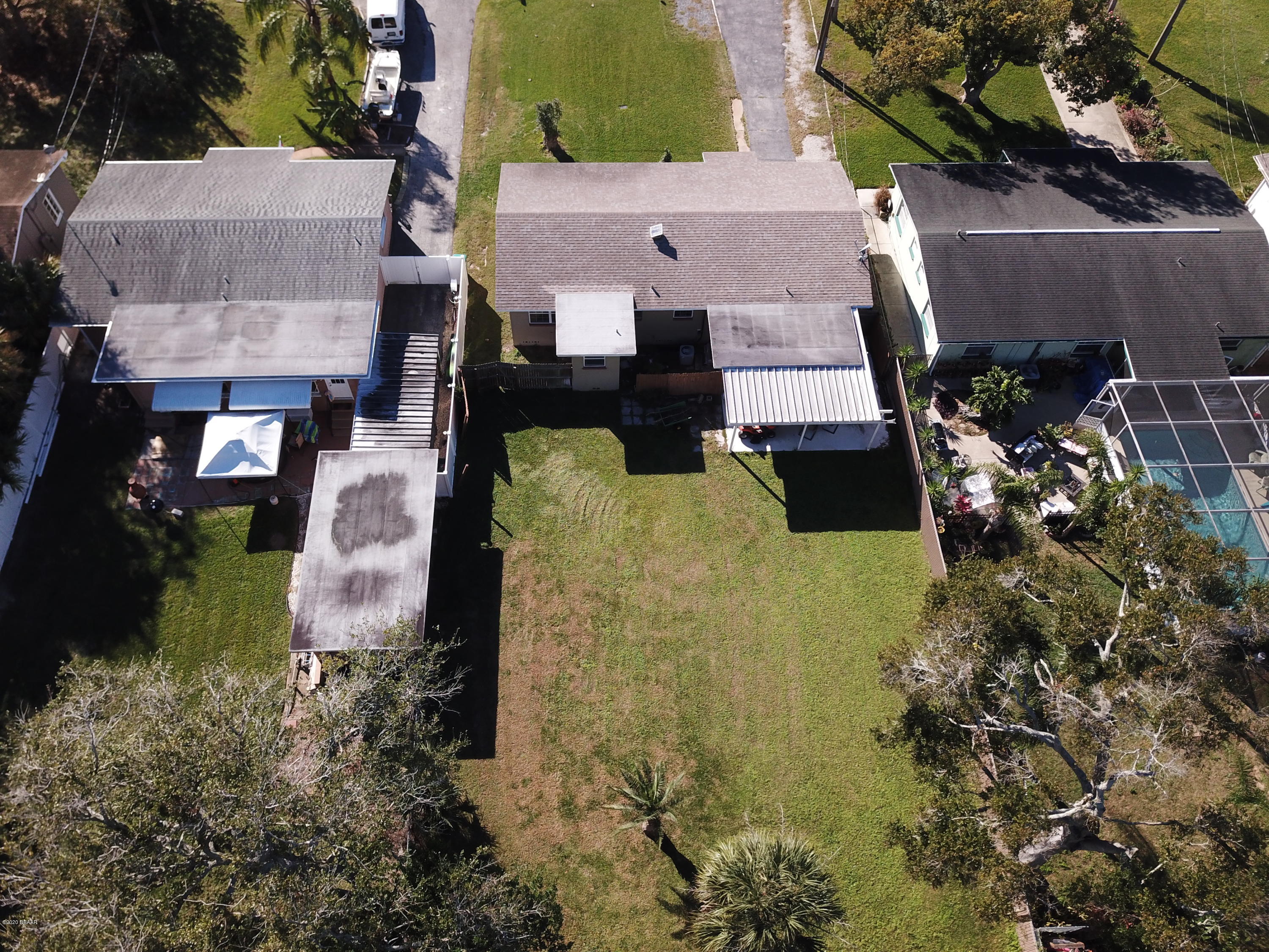 1509 Ridge Avenue Holly Hill, FL 32117 - Photo 38 of 40 an aerial view of a house with a yard