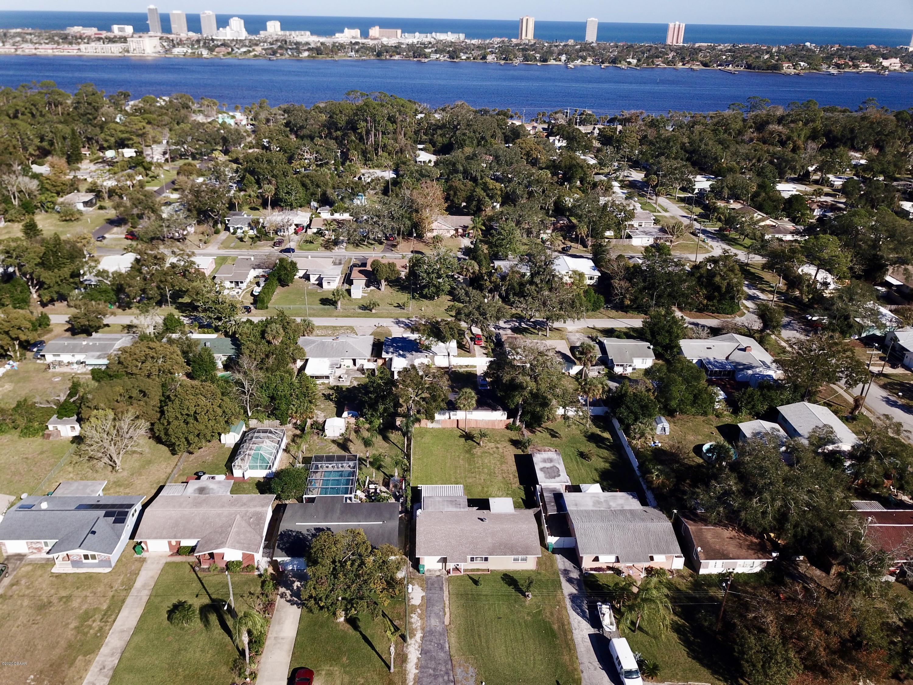 1509 Ridge Avenue Holly Hill, FL 32117 - Photo 40 of 40 an aerial view of residential houses with outdoor space