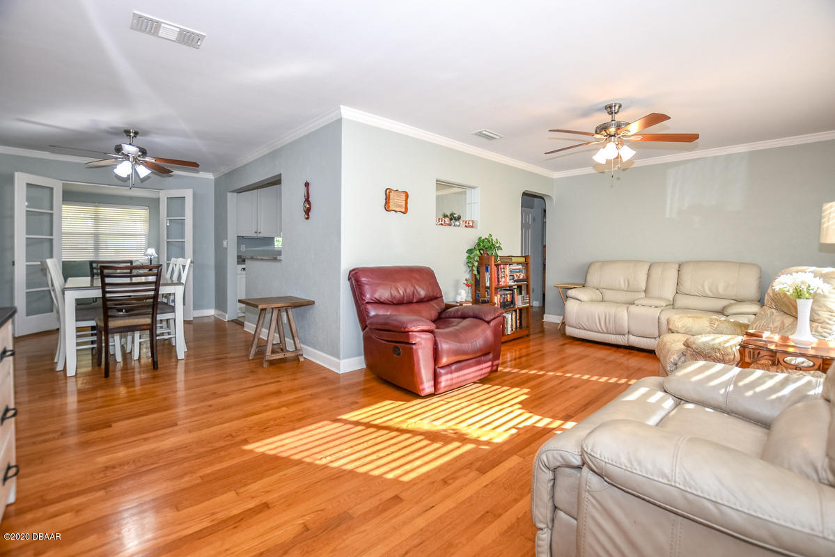1509 Ridge Avenue Holly Hill, FL 32117 - Photo 4 of 40 a living room with furniture