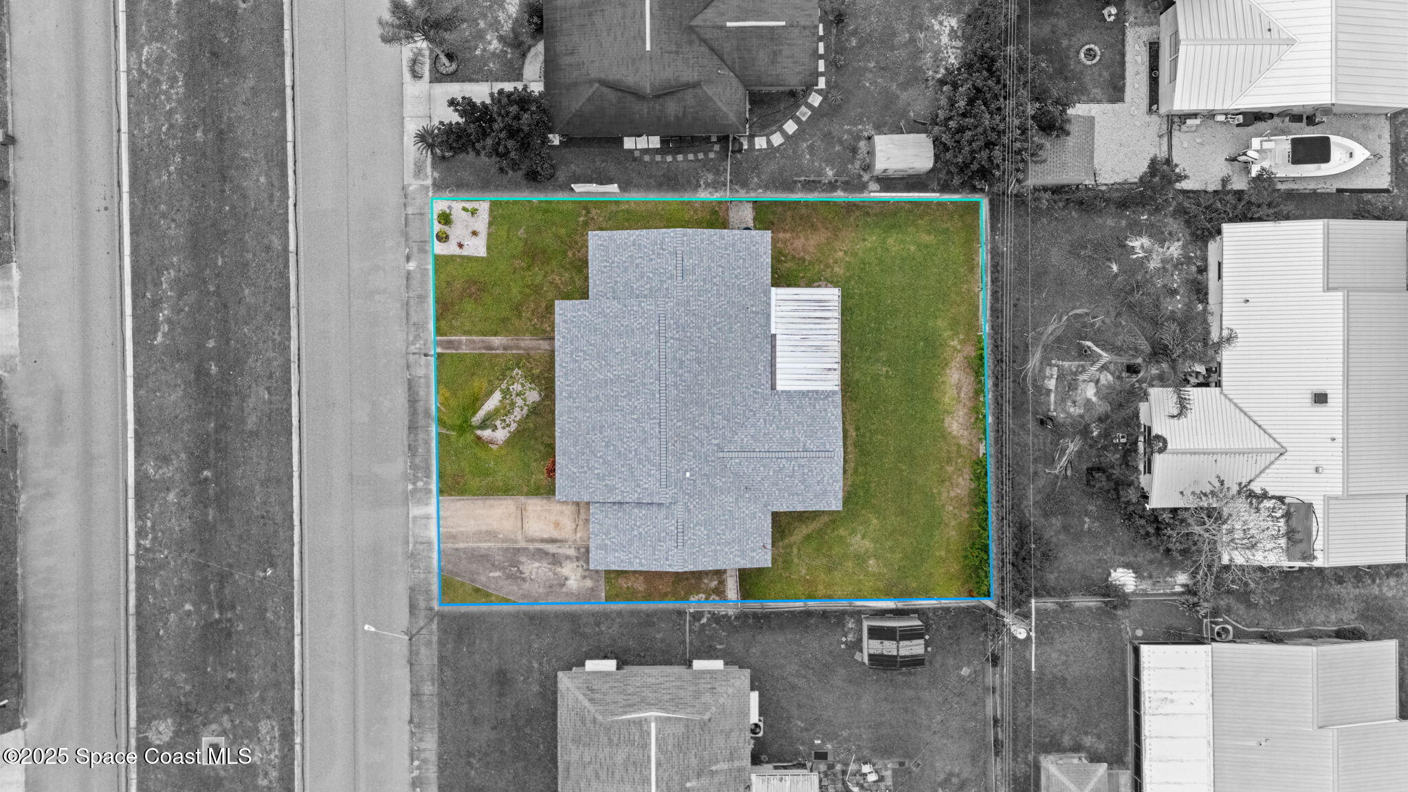 520 Croton Road Melbourne, FL 32935 - Photo 2 of 36 an aerial view of a house with a swimming pool