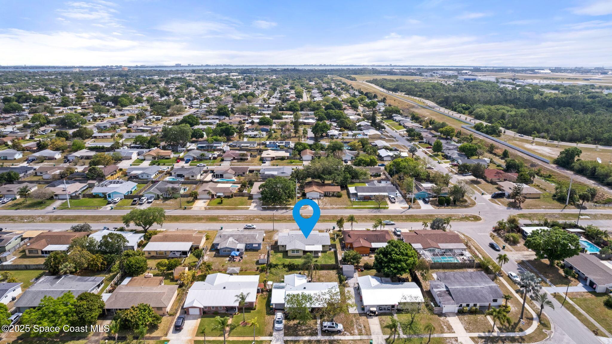 520 Croton Road Melbourne, FL 32935 - Photo 36 of 36 an aerial view of a city