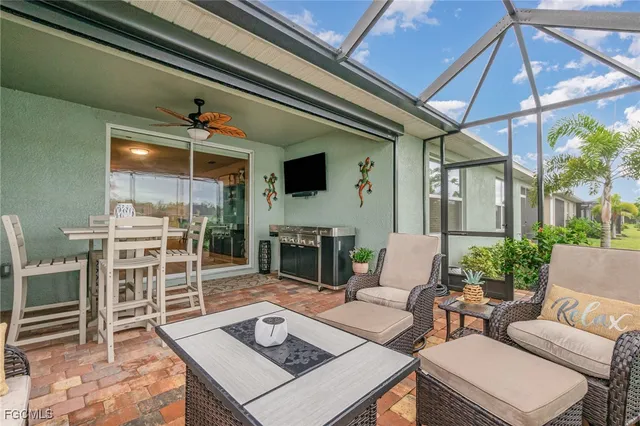 a view of a patio with couches chairs and a table