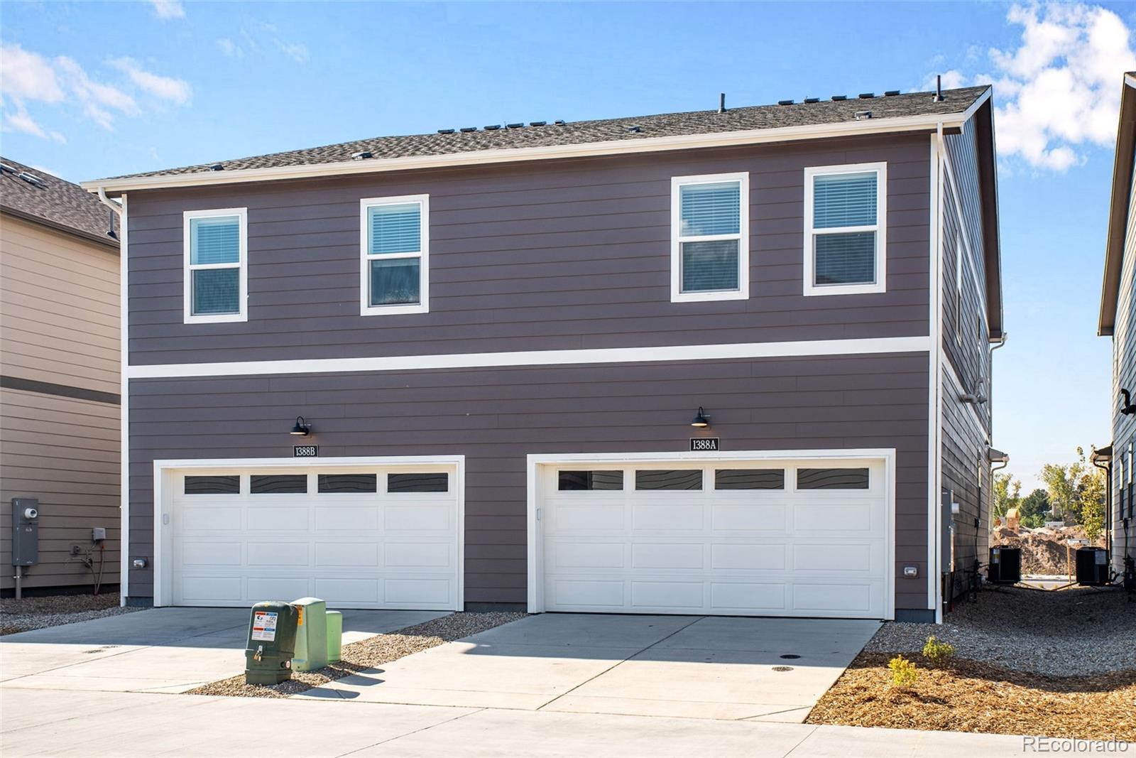 1374 South Chester Street, Unit A Denver, CO 80247 - Photo 33 of 35 a front view of a house