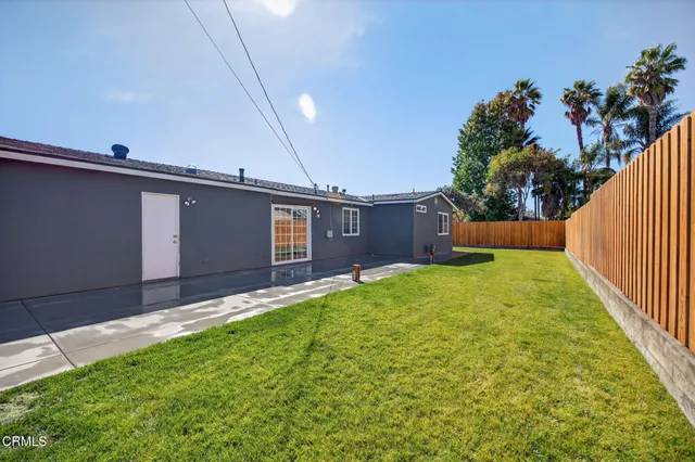 a view of a backyard with a garden