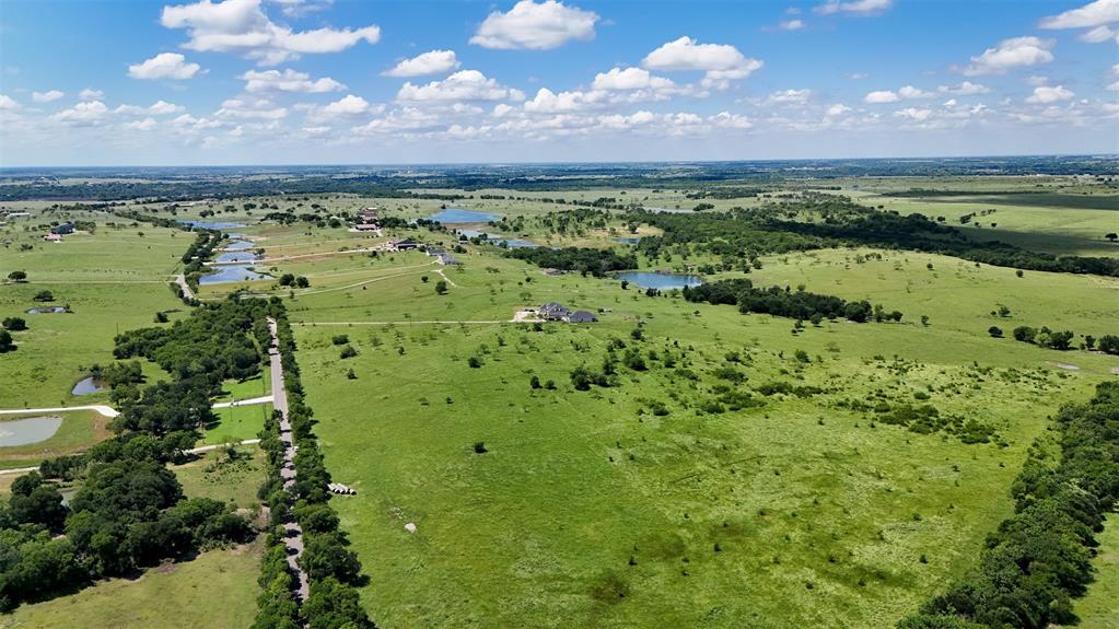 Tbd Alsdorf Road, Unit LOT 1 Ennis, TX 75119 - Photo 8 of 17 a view of a lake with a city