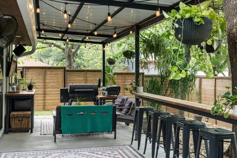 a view of a balcony with chairs