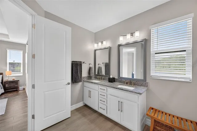 a very nice looking living room with a large window