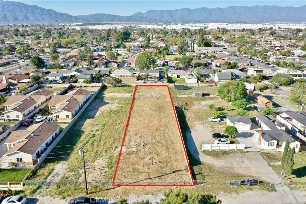 17562 Court Street Fontana, CA 92336 - Photo 2 of 16 an aerial view of residential houses with outdoor space