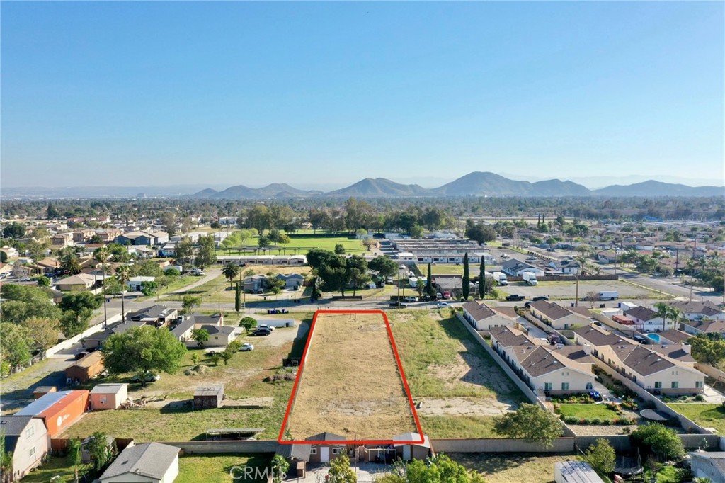 17562 Court Street Fontana, CA 92336 - Photo 6 of 16 an aerial view of residential houses with outdoor space