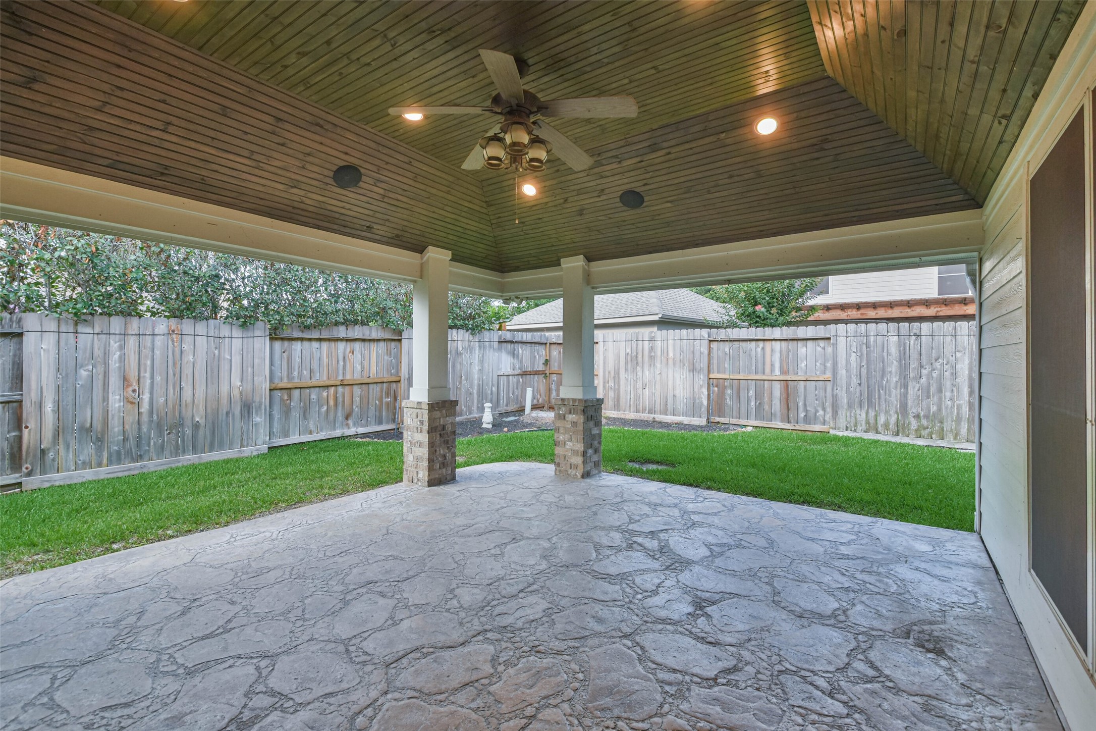 20942 Wind Field Lane Spring, TX 77379 - Photo 41 of 46 a view of a porch with furniture and garden