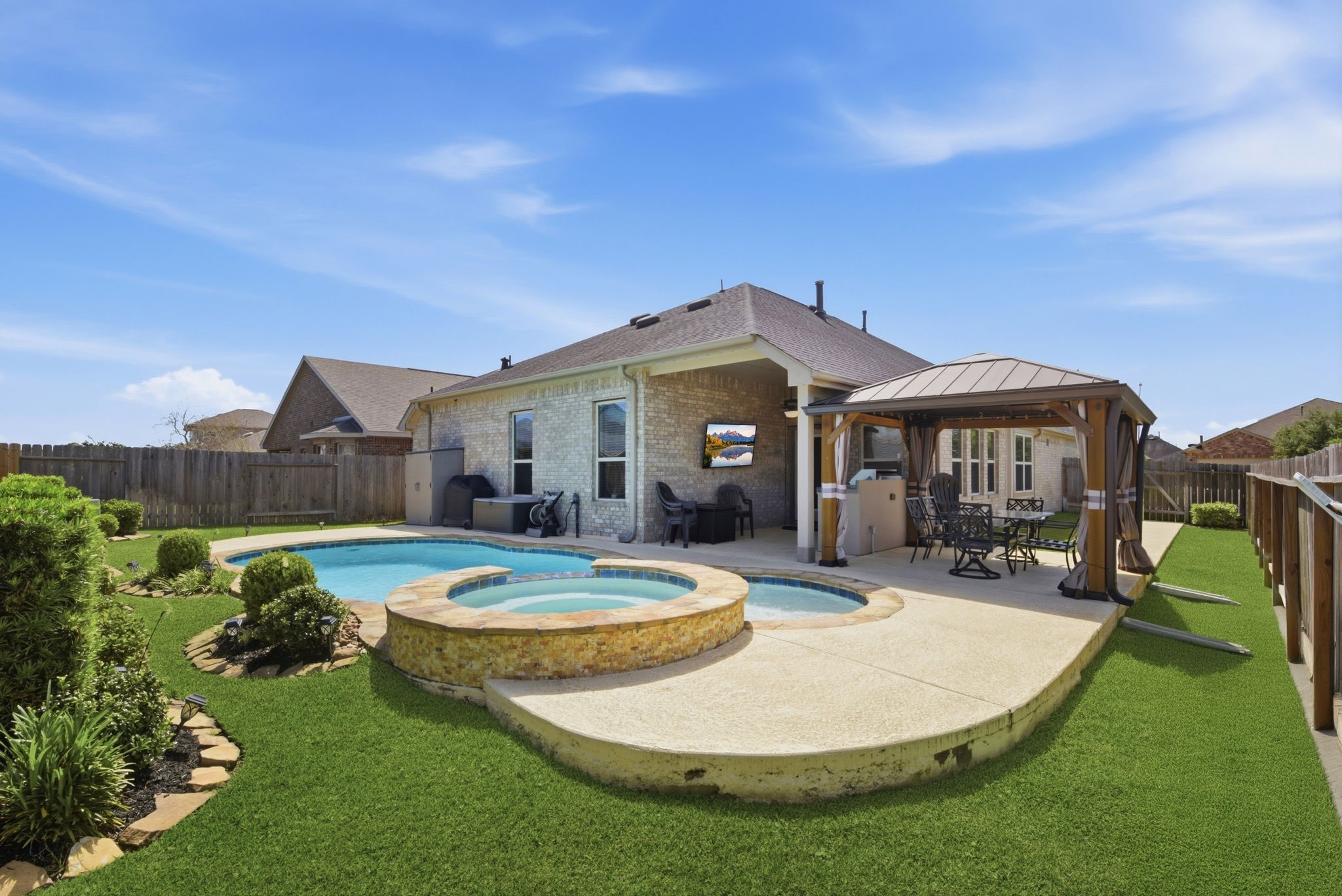 3811 Oakmist Bend Lane Spring, TX 77386 - Photo 18 of 23 a front view of a house with garden