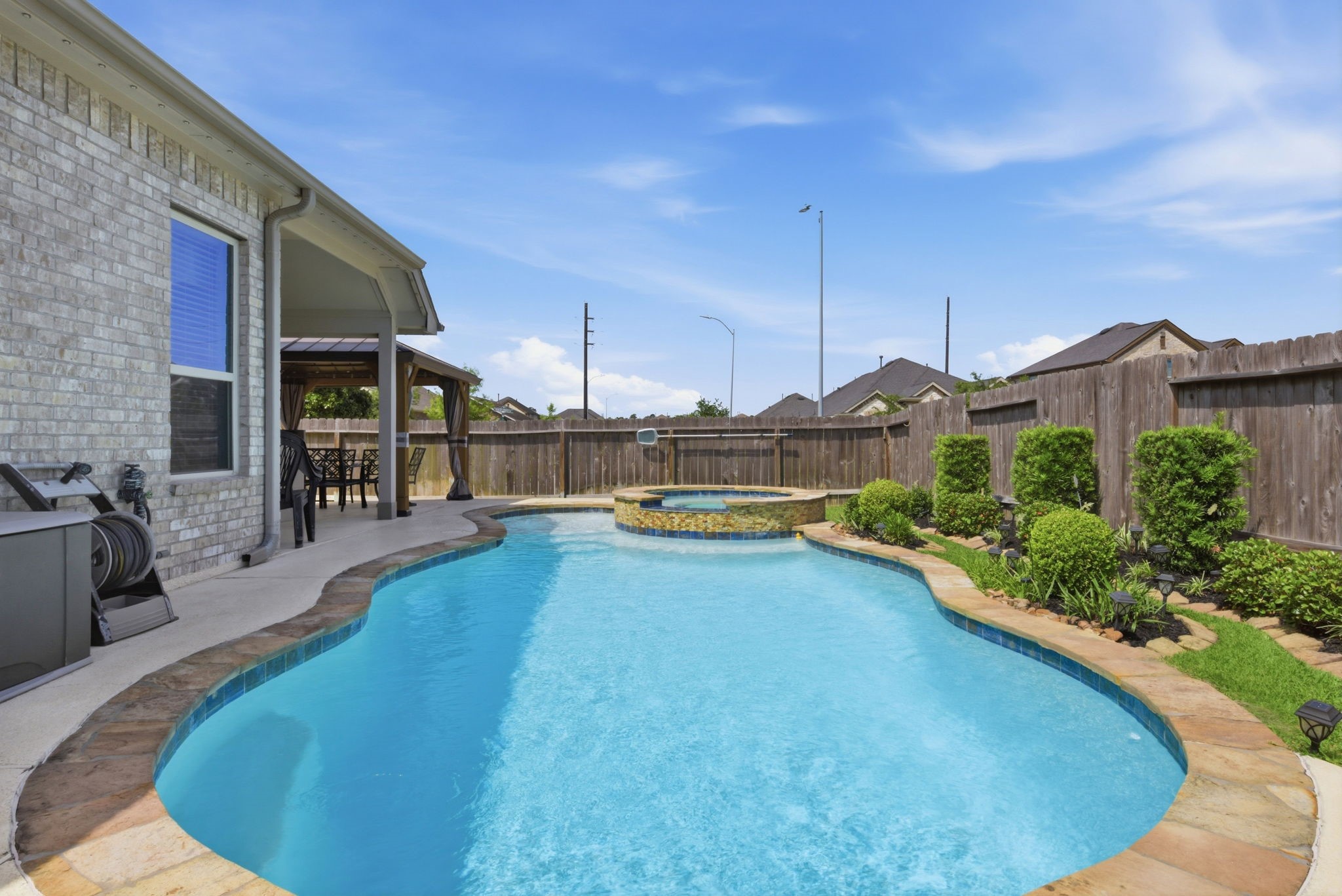 3811 Oakmist Bend Lane Spring, TX 77386 - Photo 19 of 23 a view of a house with swimming pool