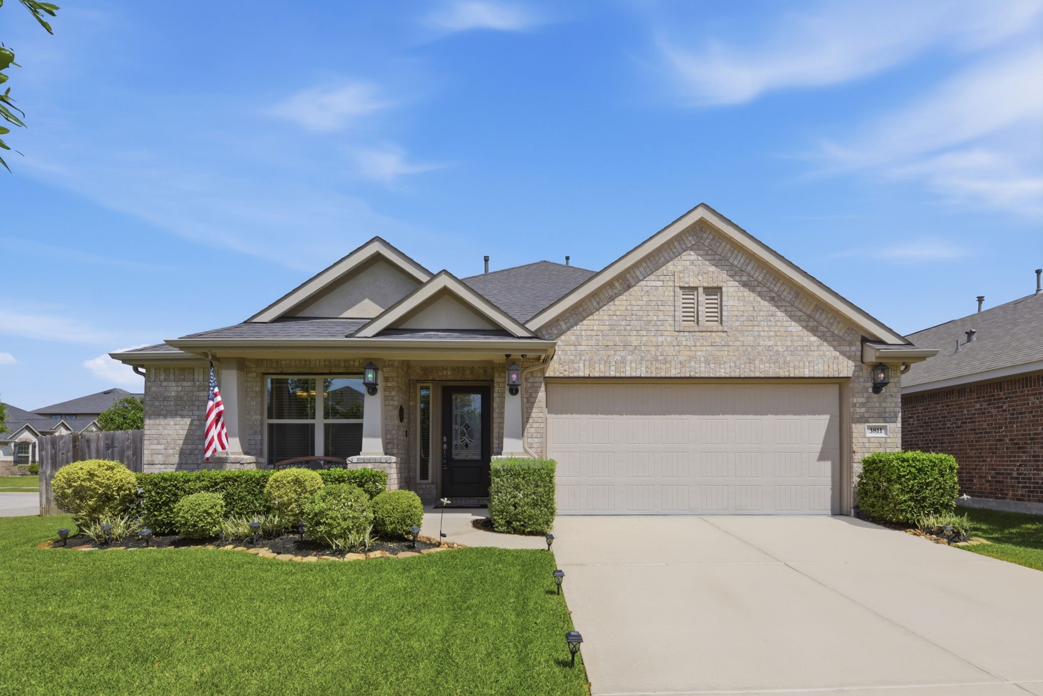 3811 Oakmist Bend Lane Spring, TX 77386 - Photo 2 of 23 a front view of a house with a yard