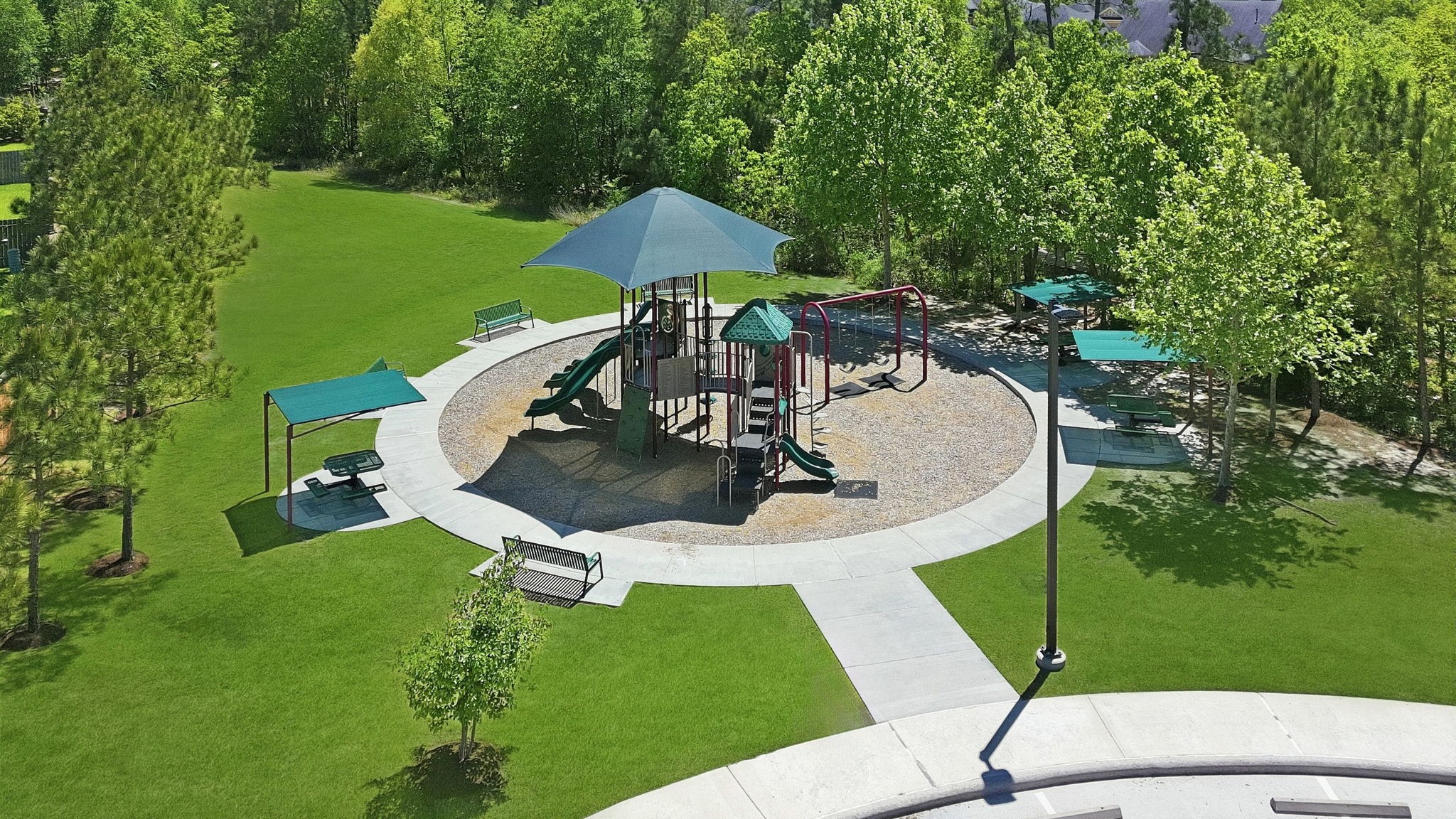 3811 Oakmist Bend Lane Spring, TX 77386 - Photo 22 of 23 a swimming pool with some trees in the background