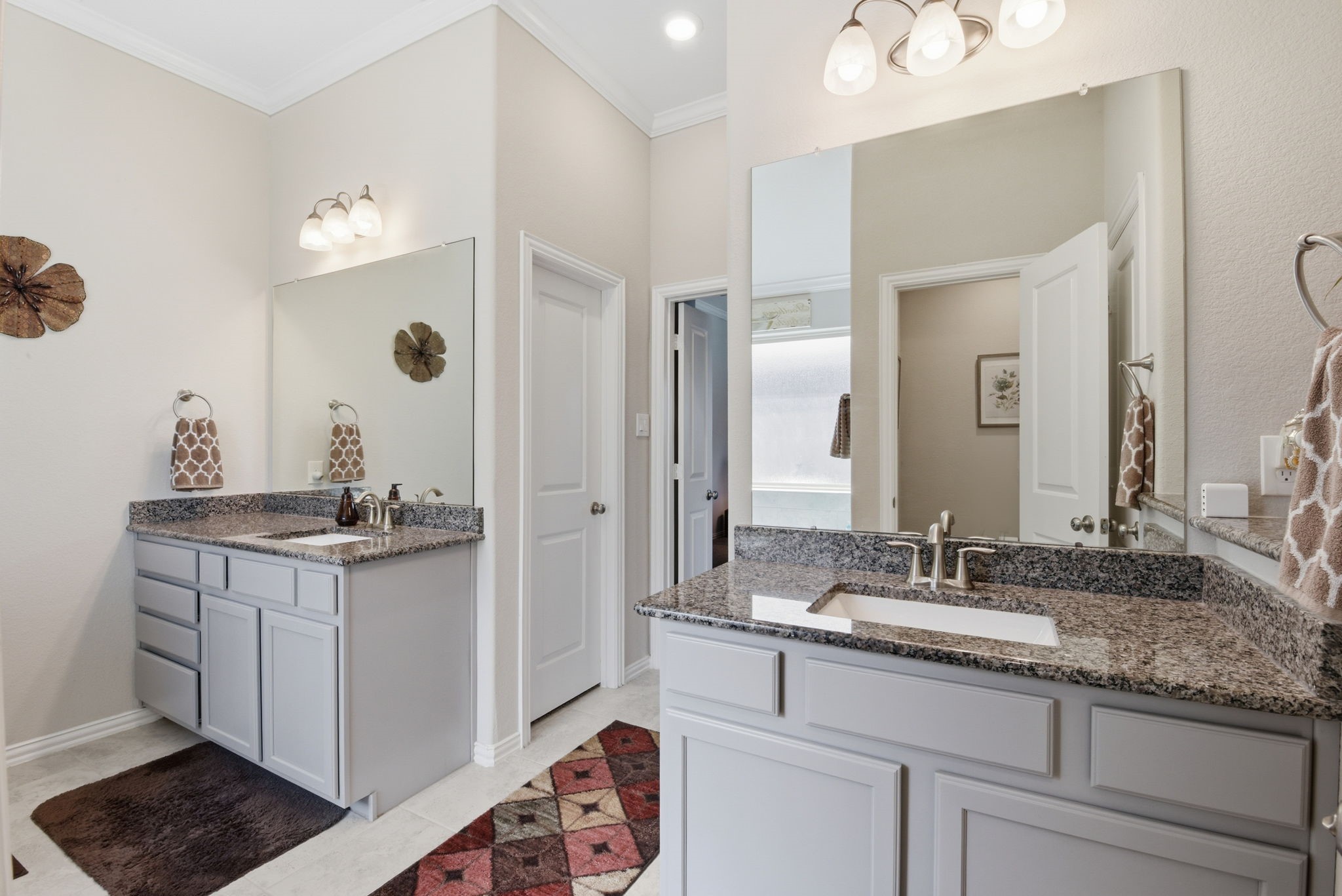 3811 Oakmist Bend Lane Spring, TX 77386 - Photo 10 of 23 a bathroom with a granite countertop sink a mirror and shower