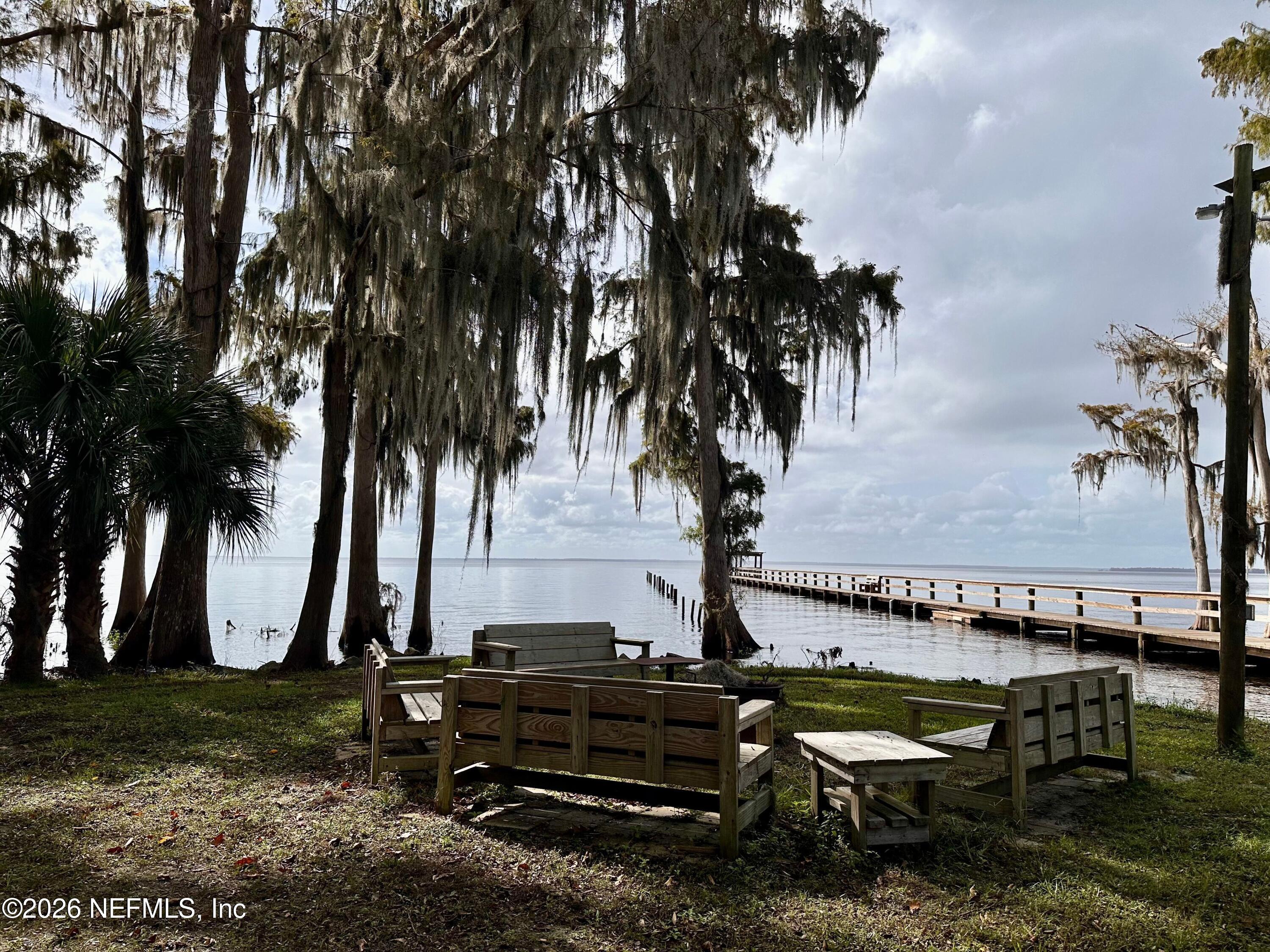 233 Marie Avenue Georgetown, FL 32139 - Photo 10 of 15 a view of a sitting area with swimming pool and sitting area