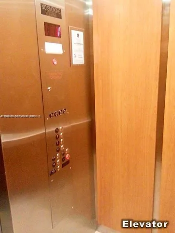 a view of a park with swings and slides