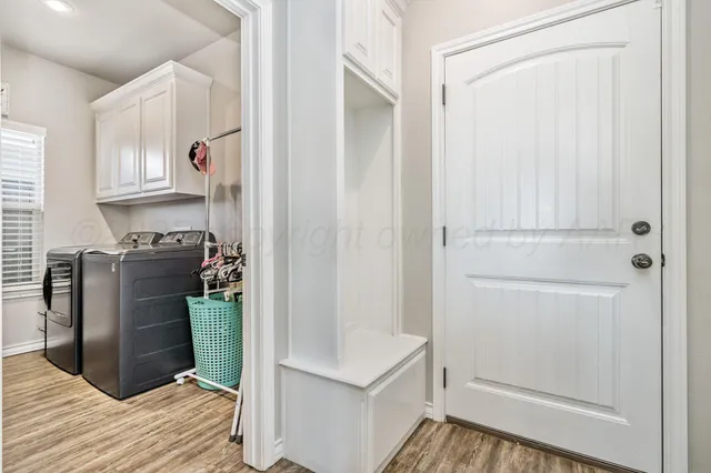 a view of kitchen with wooden floor
