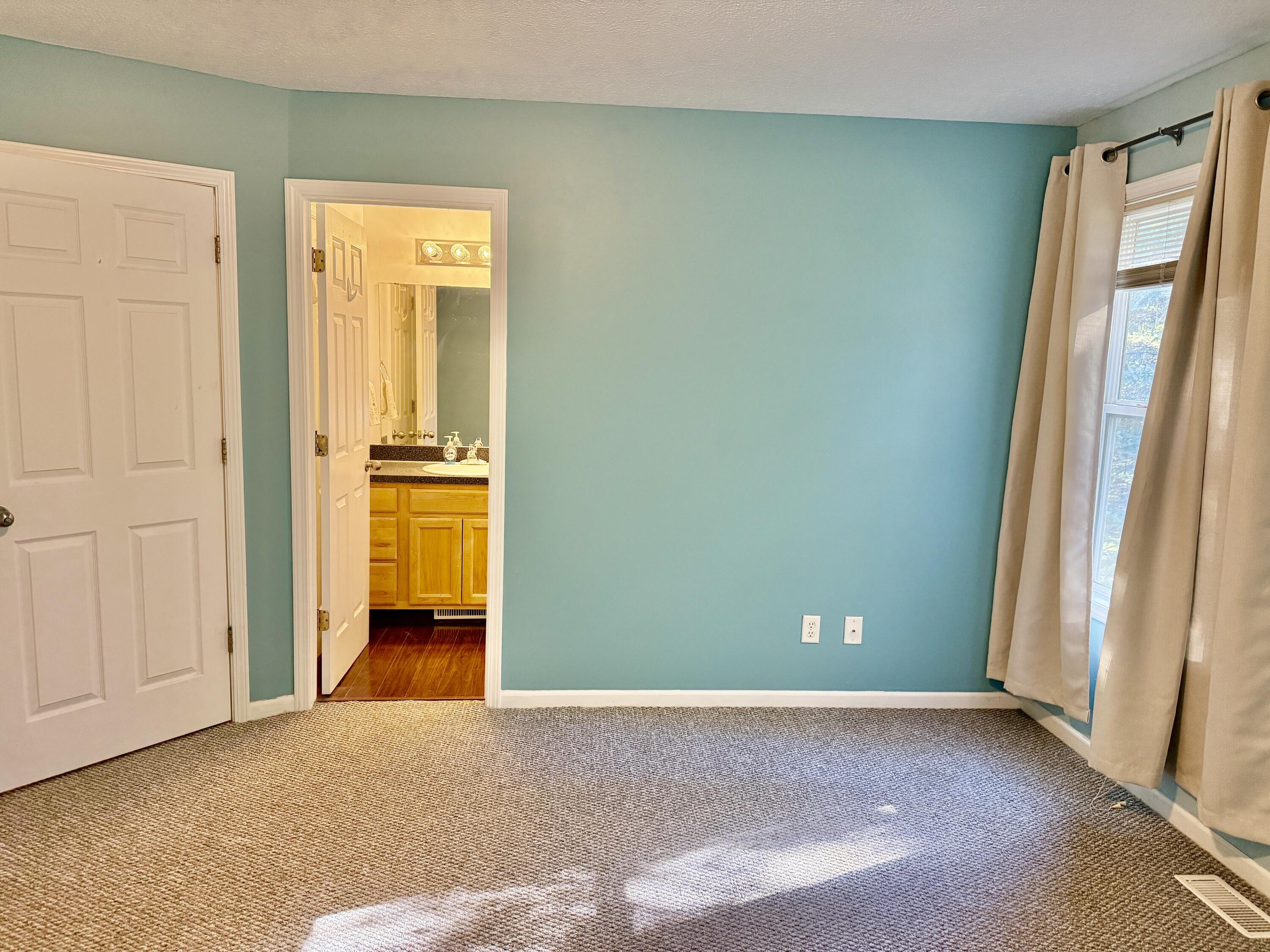 303 Wiley Road, Unit 10 Douglas, MI 49408 - Photo 20 of 43 Primary to bath