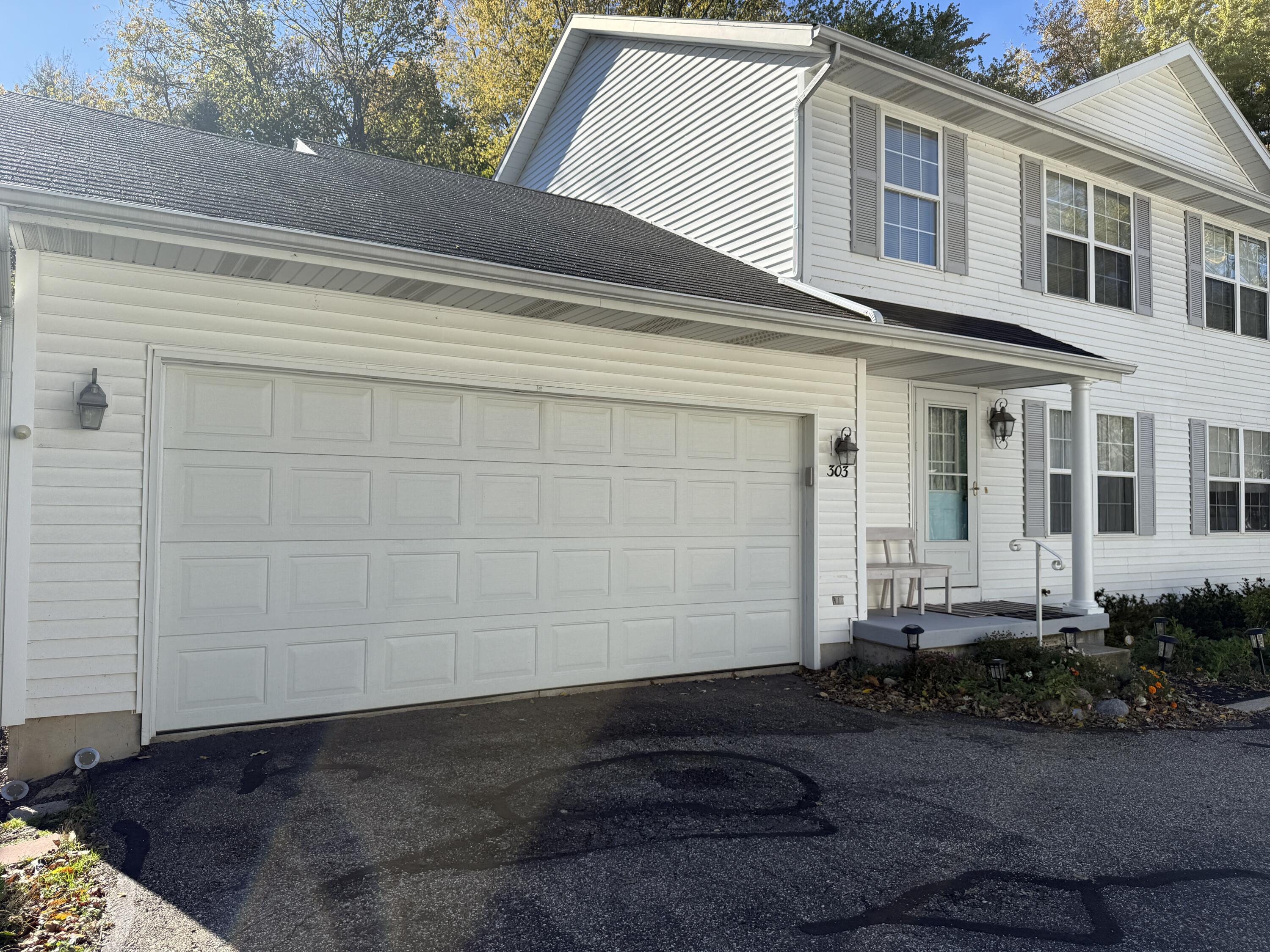 303 Wiley Road, Unit 10 Douglas, MI 49408 - Photo 33 of 43 Large attached 2 car garage