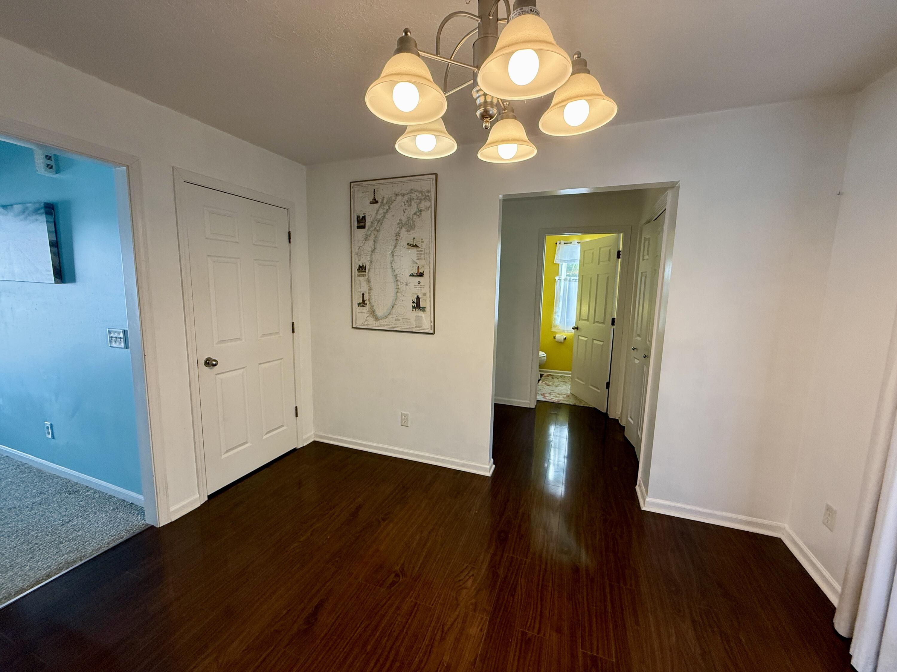 303 Wiley Road, Unit 10 Douglas, MI 49408 - Photo 8 of 43 Half bath and 1st floor laundry