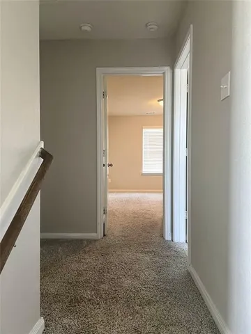 a view of entryway with bathroom