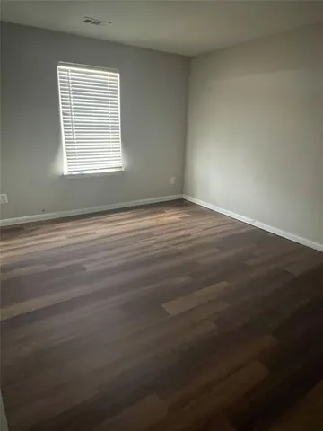 a bathroom with a bathtub and a sink