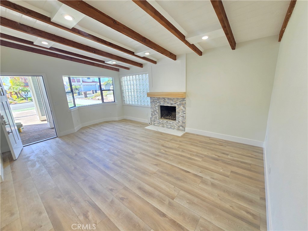 34516 Via Verde Dana Point, CA 92624 - Photo 15 of 15 a view of empty room with wooden floor and fireplace