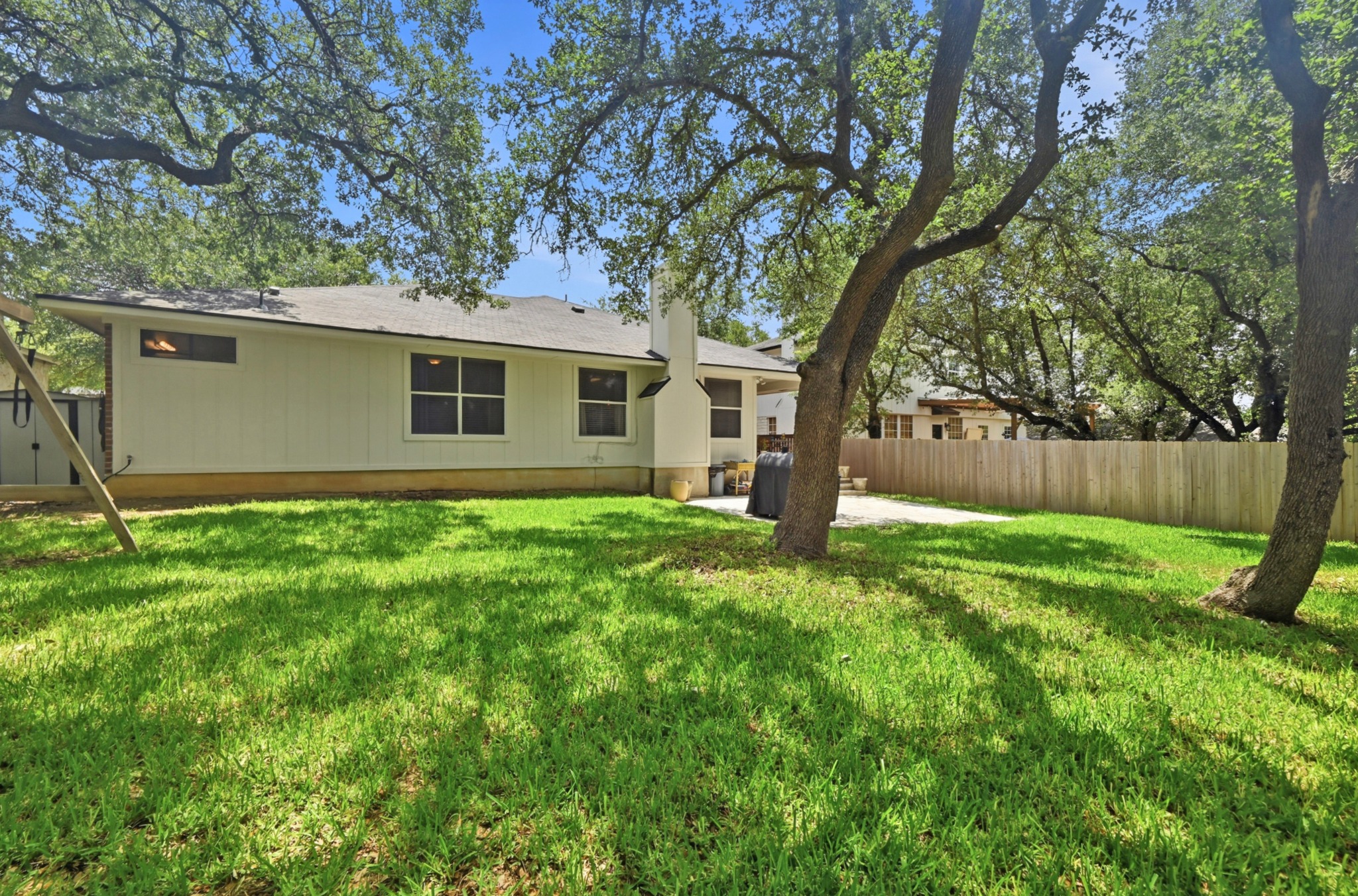 1409 Knoll Ridge Drive Cedar Park, TX 78613 - Photo 27 of 30 A generous backyard offers a private retreat with mature trees providing ample natural shade.