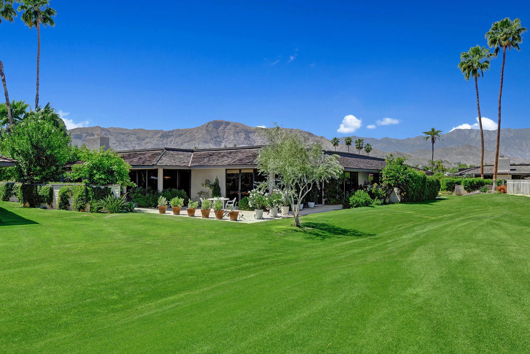 30 Duke Drive Rancho Mirage, CA 92270 - Photo 30 of 38 BACK CORNER OF UNIT TO MOUNTAINS