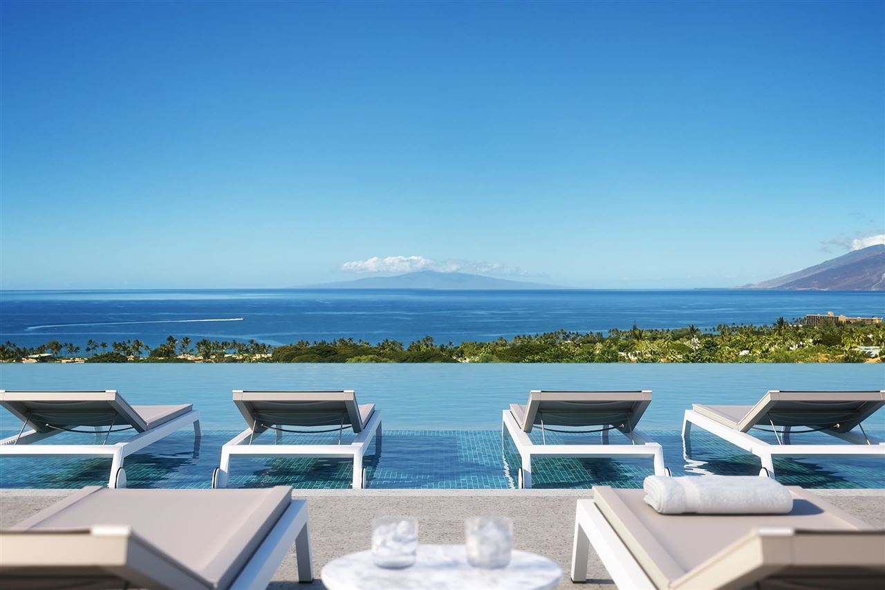 72 Kai Malu Drive, Unit 202 Kihei, HI 96753 - Photo 5 of 8 a view of furniture and city view