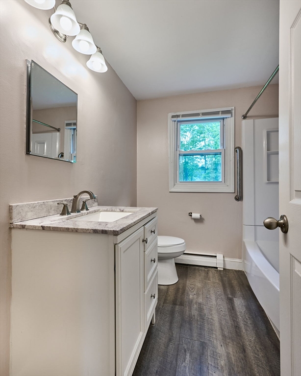 48 Austin Circle Northampton, MA 01062 - Photo 15 of 33 a bathroom with a granite countertop sink mirror and a toilet