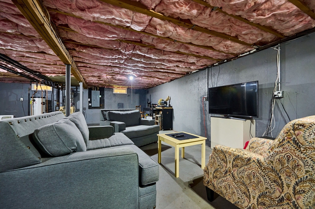 48 Austin Circle Northampton, MA 01062 - Photo 19 of 33 a living room with furniture and a flat screen tv