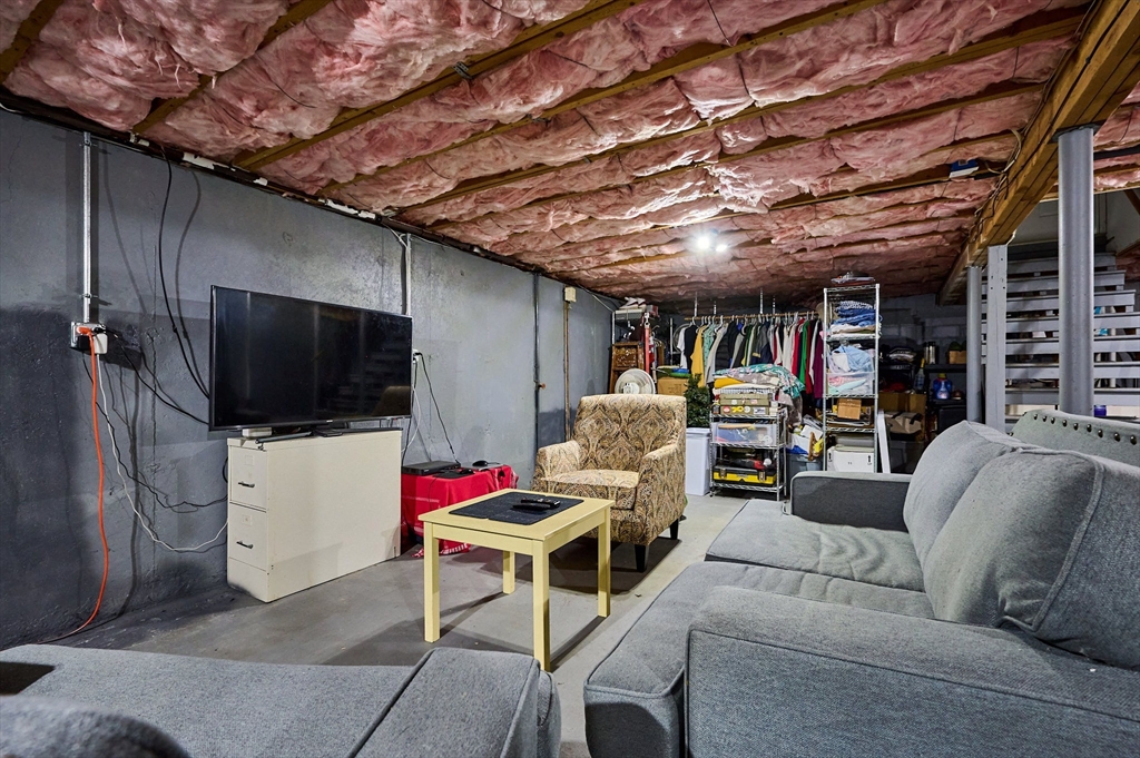 48 Austin Circle Northampton, MA 01062 - Photo 20 of 33 a living room with furniture and a flat screen tv