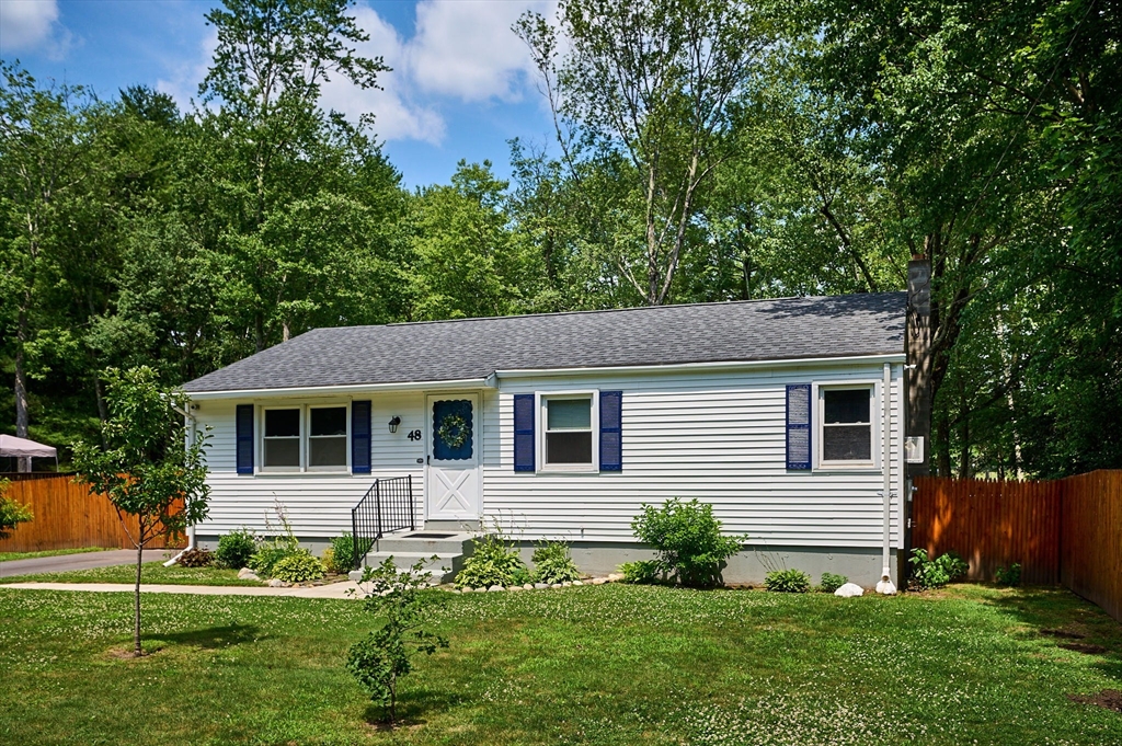 48 Austin Circle Northampton, MA 01062 - Photo 2 of 33 a front view of a house with a yard