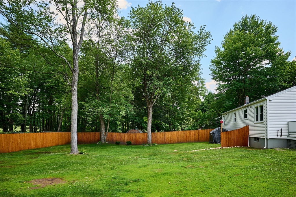 48 Austin Circle Northampton, MA 01062 - Photo 23 of 33 a view of a house with a yard and sitting area