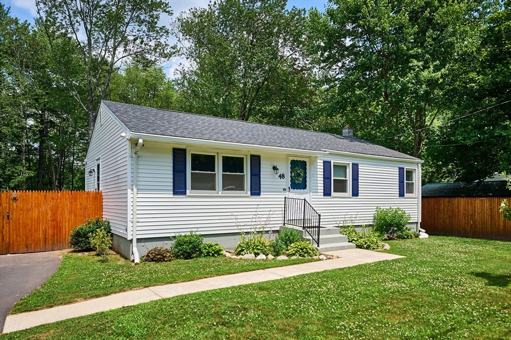 48 Austin Circle Northampton, MA 01062 - Photo 3 of 33 a front view of a house with garden