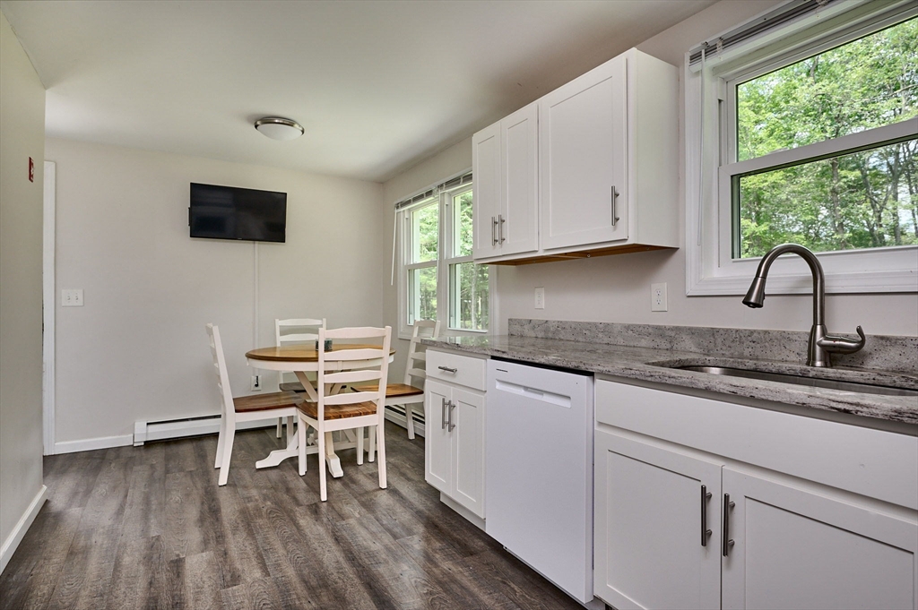 48 Austin Circle Northampton, MA 01062 - Photo 4 of 33 a kitchen with a sink cabinets and wooden floor