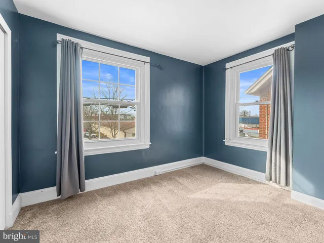 a view of an empty room with window